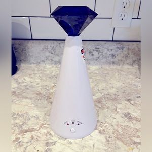Brand new Pet laser chase toy. Blue diamond top